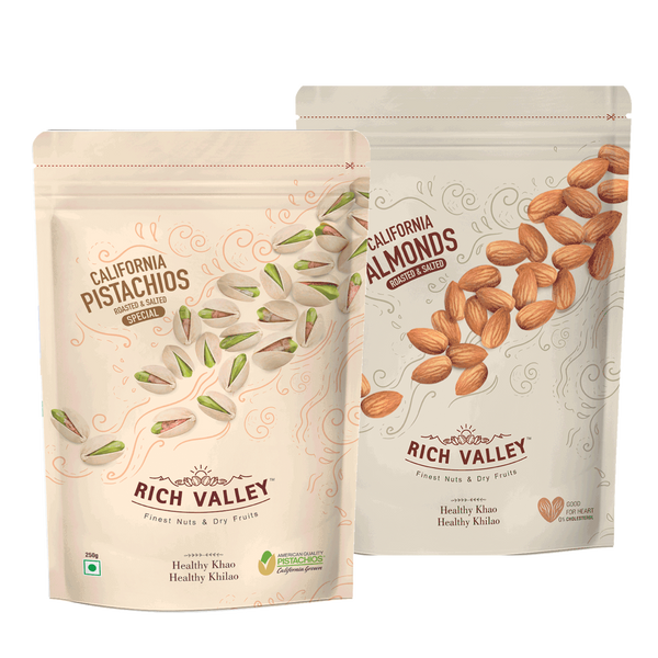 Two packages of Rich Valley pistachios and almonds on a white background

