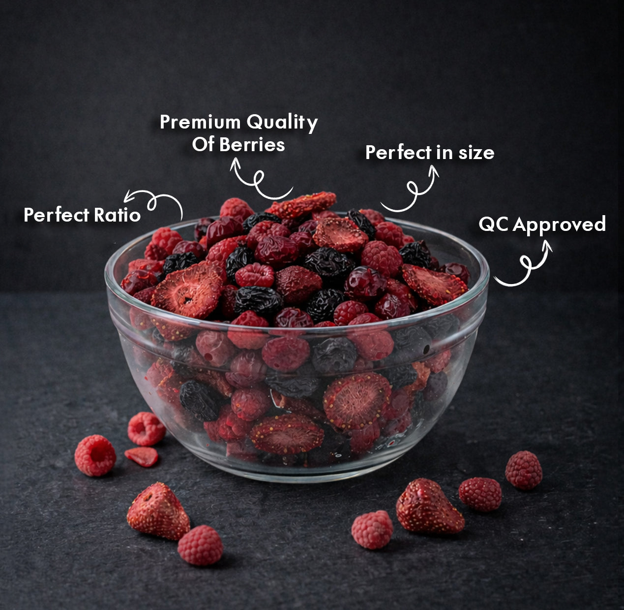 Clear glass bowl filled with mixed dried berries on a dark background with quality and size text highlights