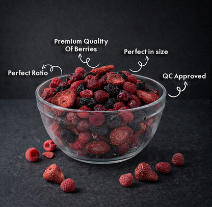 Clear glass bowl filled with mixed dried berries on a dark background with quality and size text highlights