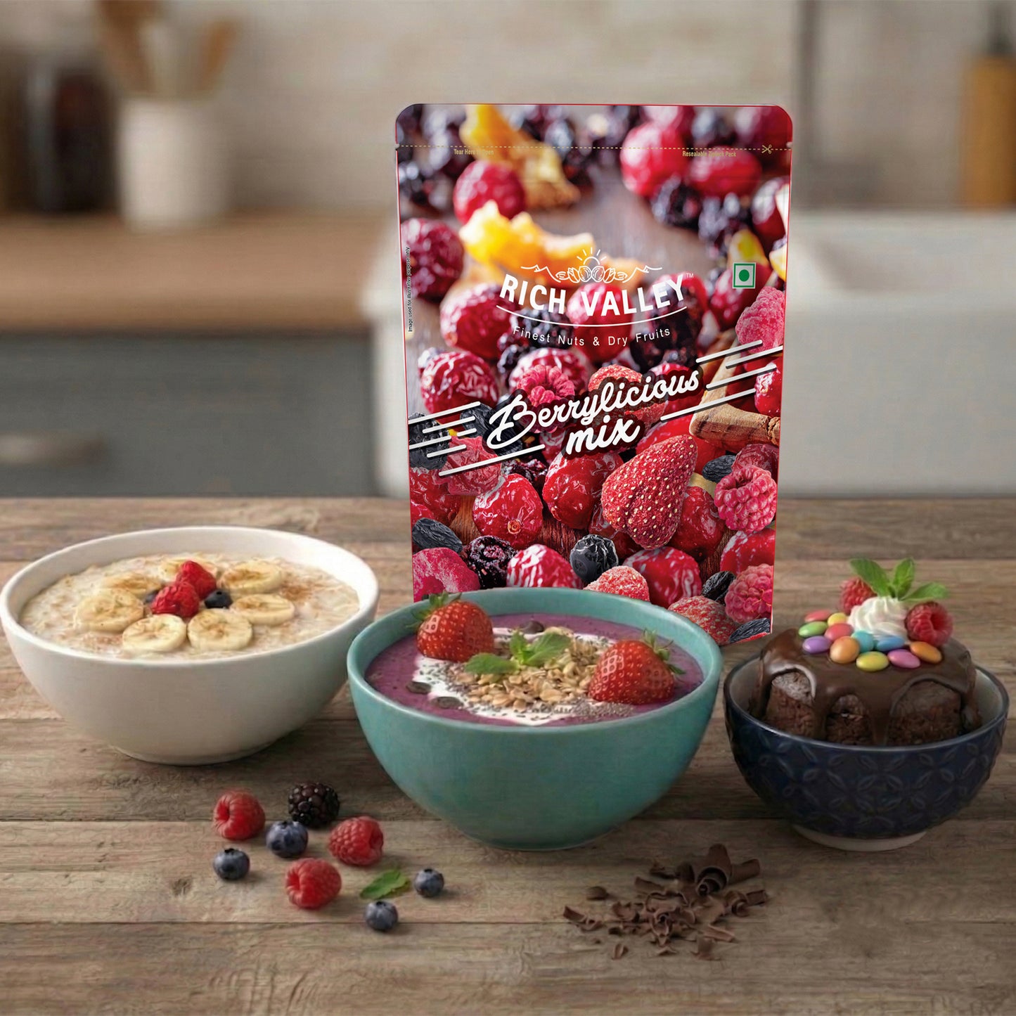 Rich Valley Berrylicious mix packaging with bowls of oatmeal, smoothie, and dessert on a wooden table
