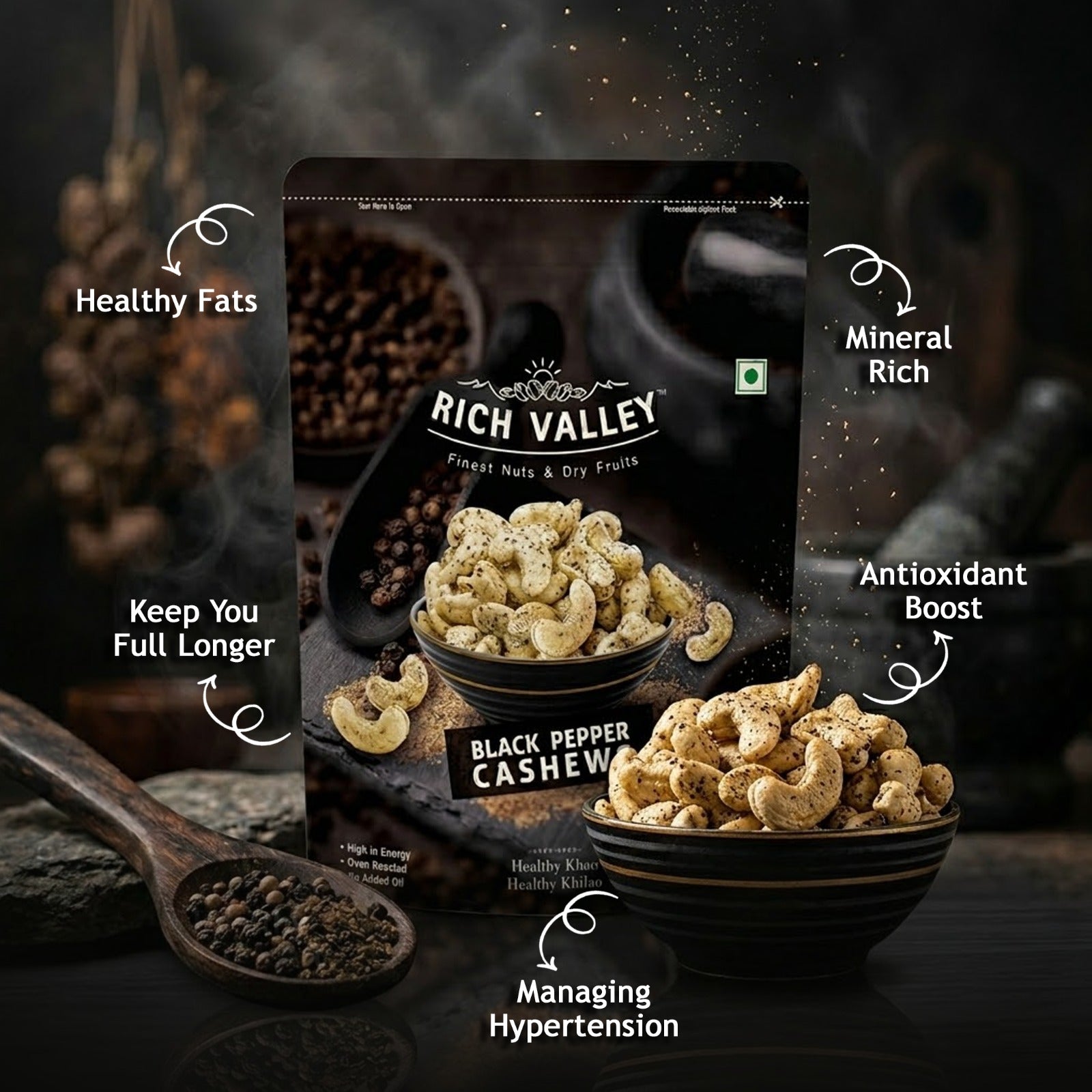Rich Valley black pepper cashew packaging with cashews and spices on a dark background