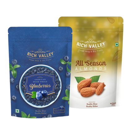 Two Rich Valley packages of blueberries and almonds on white background