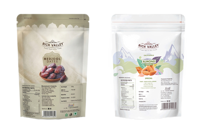 Two Rich Valley packages of Medjool dates and California almond kernels on white background