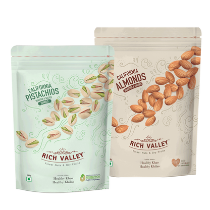 Two Rich Valley nut packages with pistachios and almonds on a white background