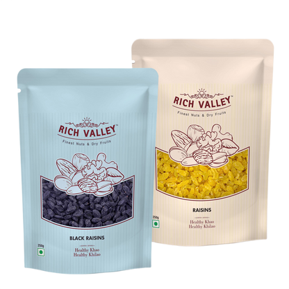 Two Rich Valley packages of black raisins and raisins on white background