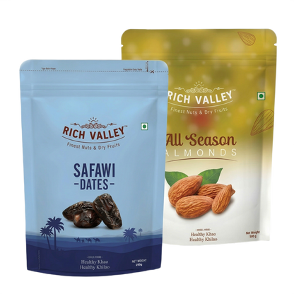 Two Rich Valley packages of Safawi dates and all season almonds on white background